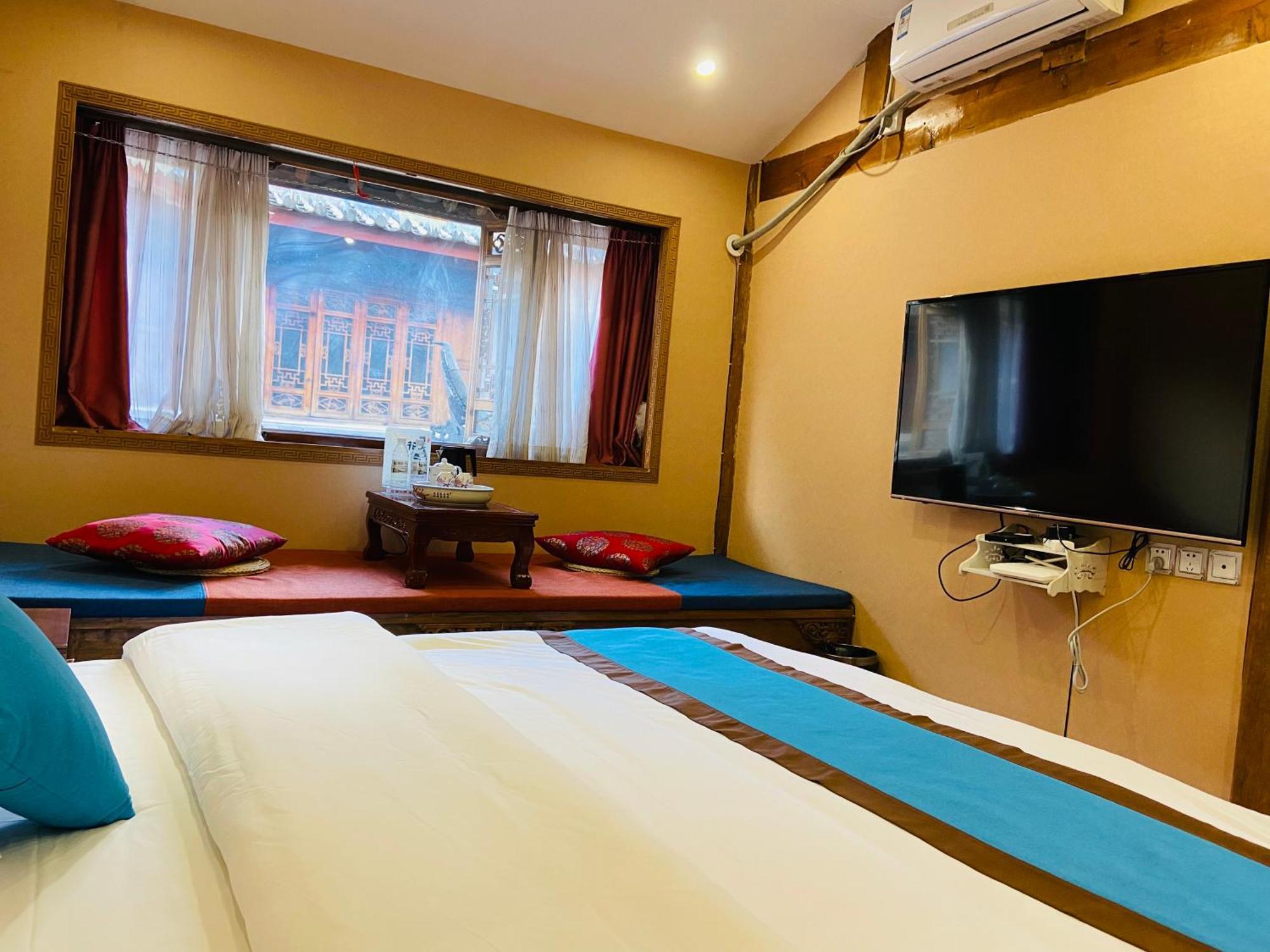 Juxian Boutique Homestay Лицзян Экстерьер фото