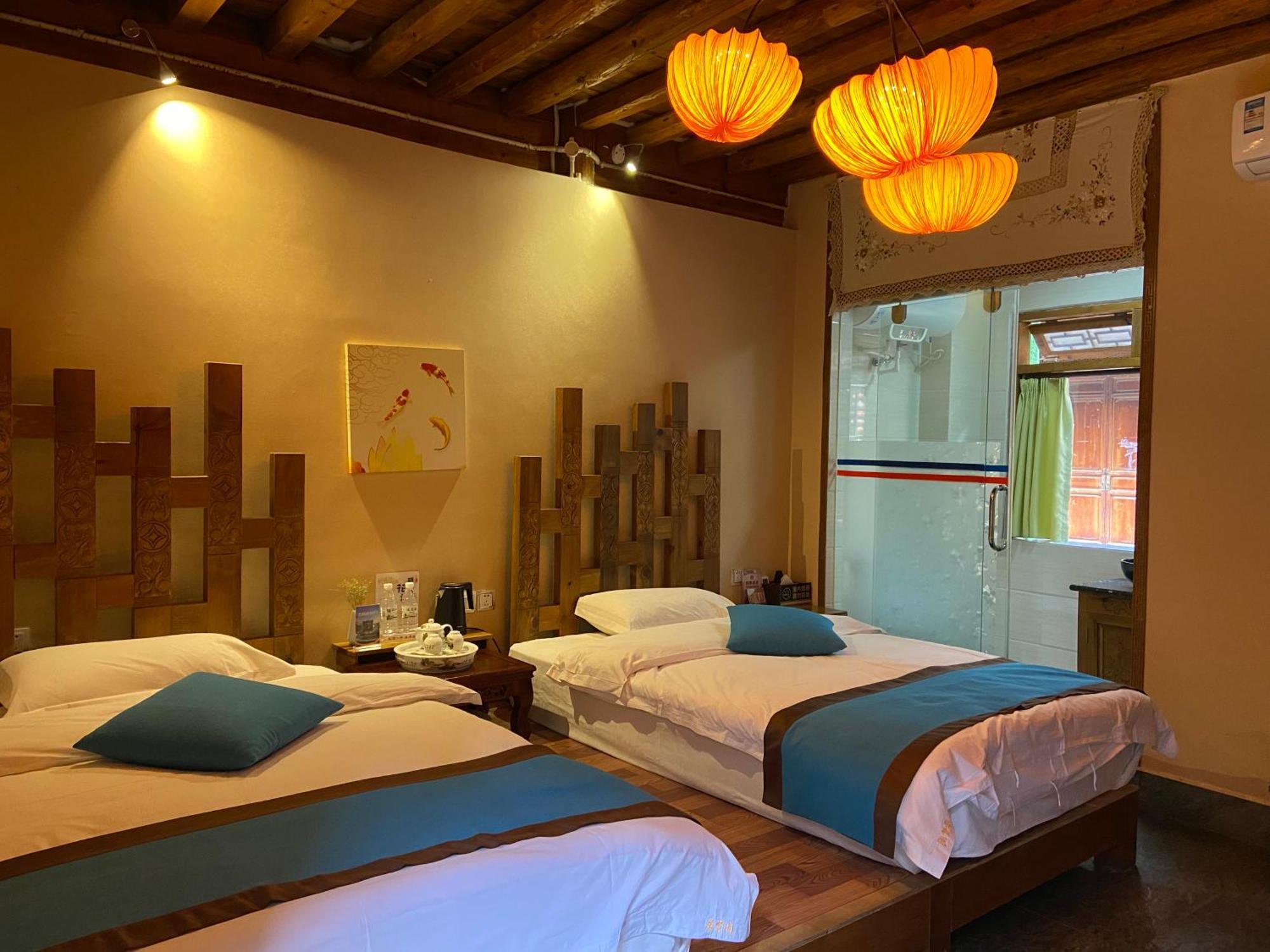 Juxian Boutique Homestay Лицзян Экстерьер фото