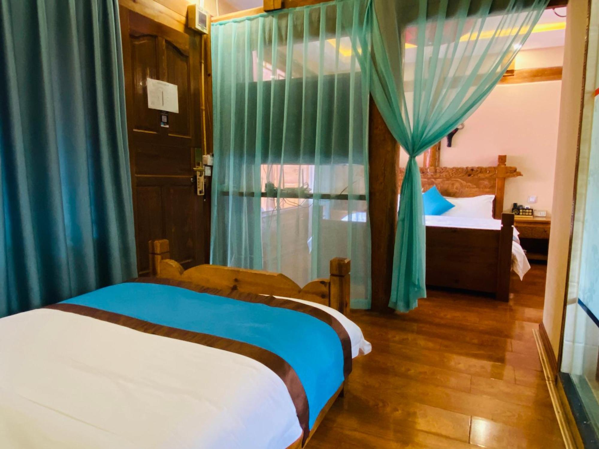 Juxian Boutique Homestay Лицзян Экстерьер фото