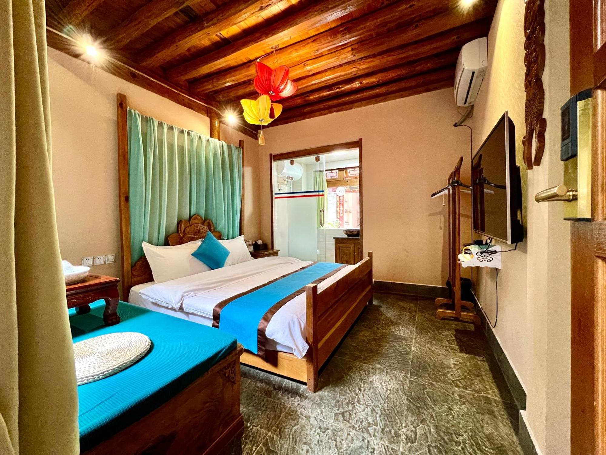 Juxian Boutique Homestay Лицзян Экстерьер фото